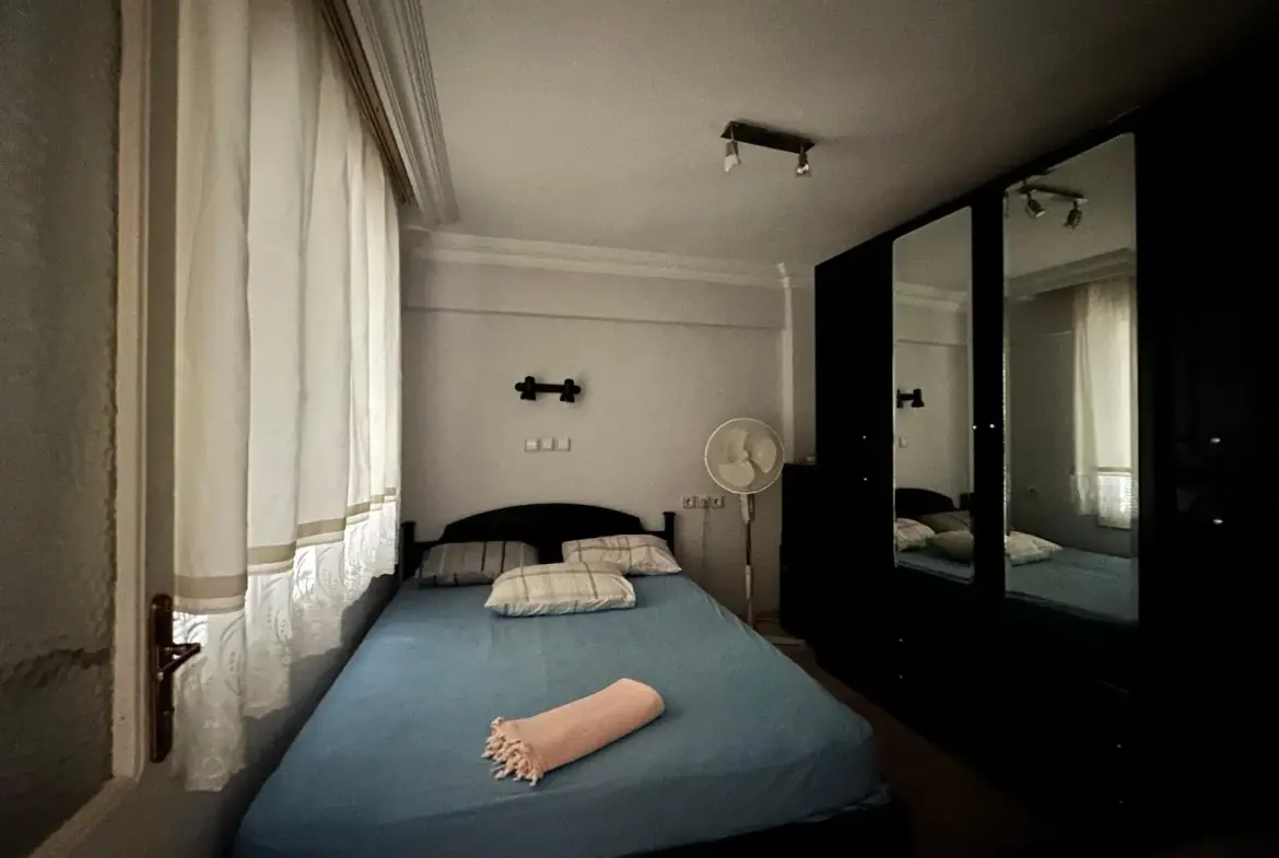 MERKEZDE TAHSİN BAYKAL CADDESİNDE SATILIK DAİRE