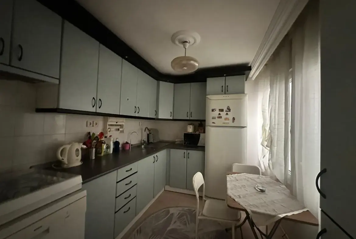MERKEZDE TAHSİN BAYKAL CADDESİNDE SATILIK DAİRE