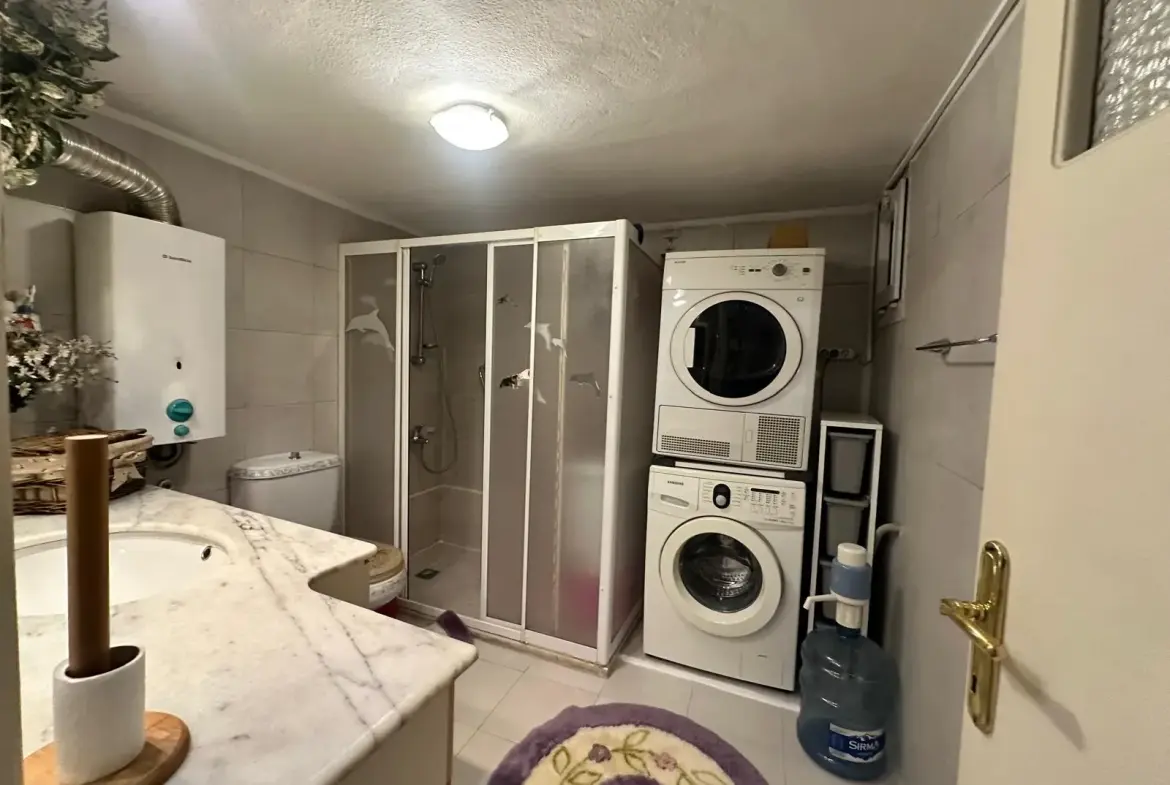 MERKEZDE TAHSİN BAYKAL CADDESİNDE SATILIK DAİRE