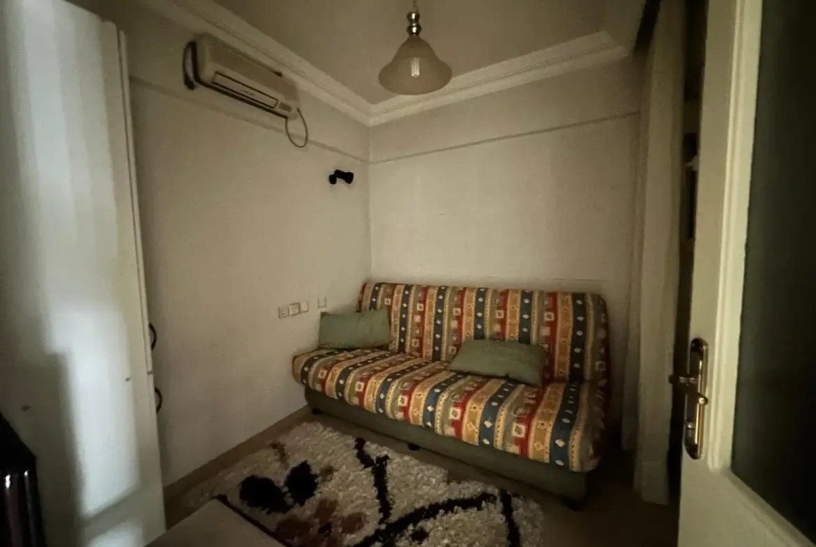 MERKEZDE TAHSİN BAYKAL CADDESİNDE SATILIK DAİRE