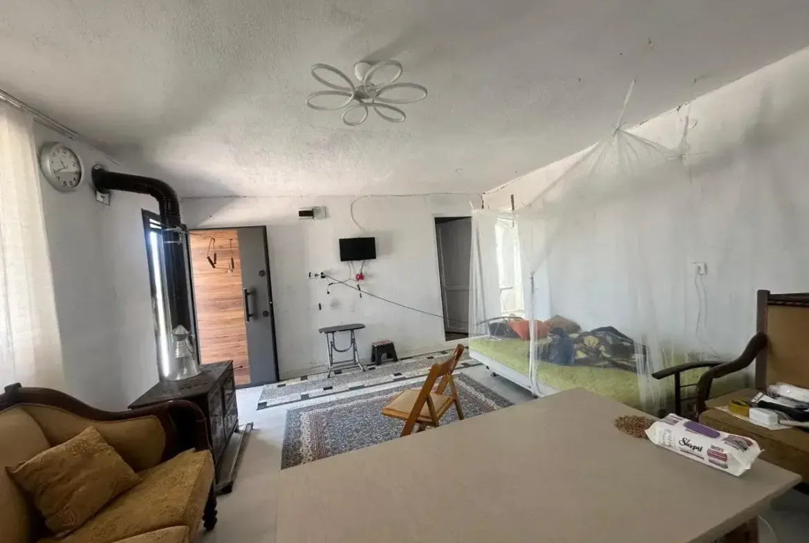 SOMA DUALAR'DA 12.350 M² SATILIK TARLA VE EV