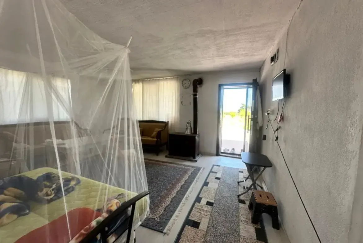 SOMA DUALAR'DA 12.350 M² SATILIK TARLA VE EV